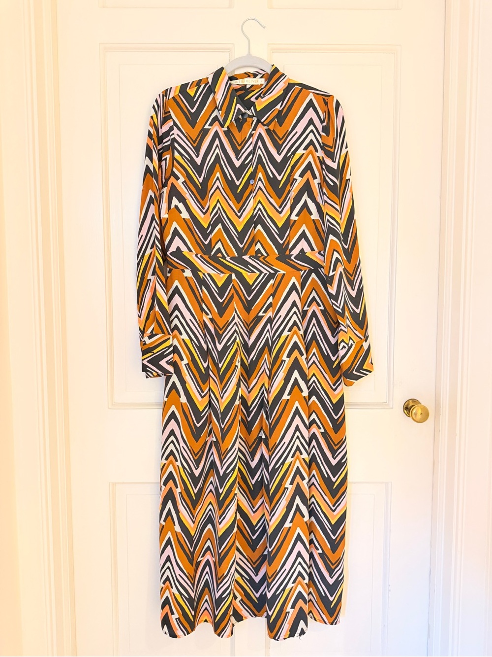Marie Oliver Long Sleeve Chevron Midi Dress in Mustard, Black, White, and Cream